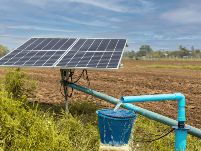 Solar panels powering a water pump